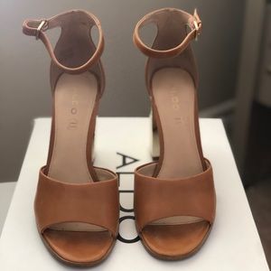Brown leather also sandal heels. Size 7 1/2